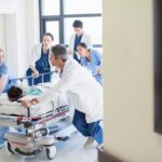 Patient being wheeled into ER on a stretcher