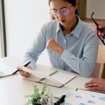 Nurse meeting with a physician.